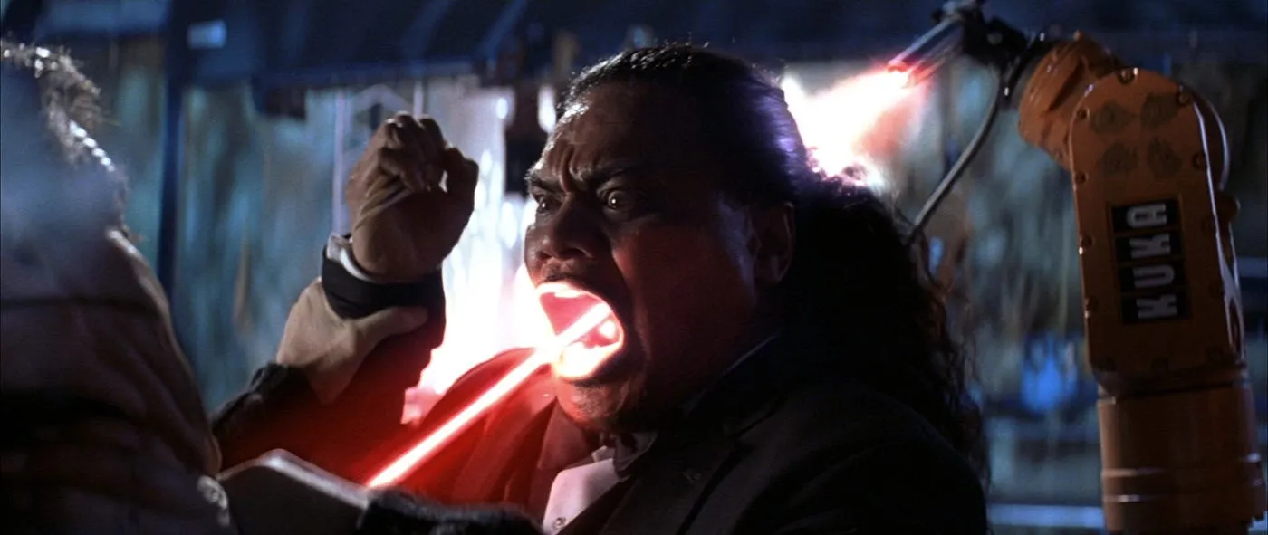 A henchman takes a laser beam to the face in Die Another Day