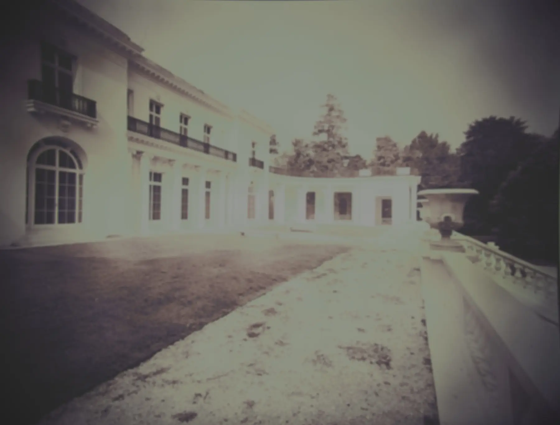 A shadowy backyard at dusk