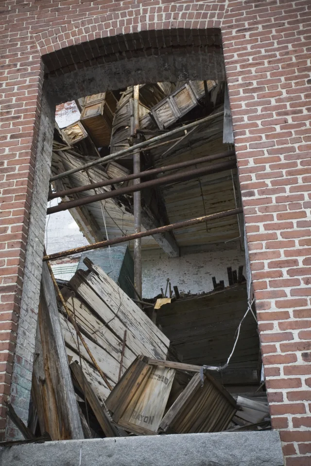 Crates exploding from the window