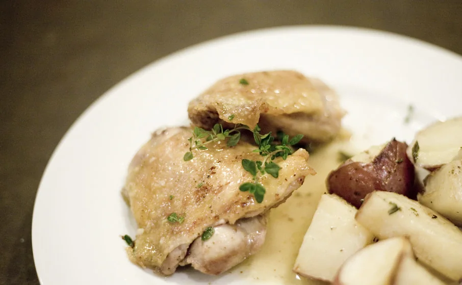 Roast chicken and potatoes with lemon thyme