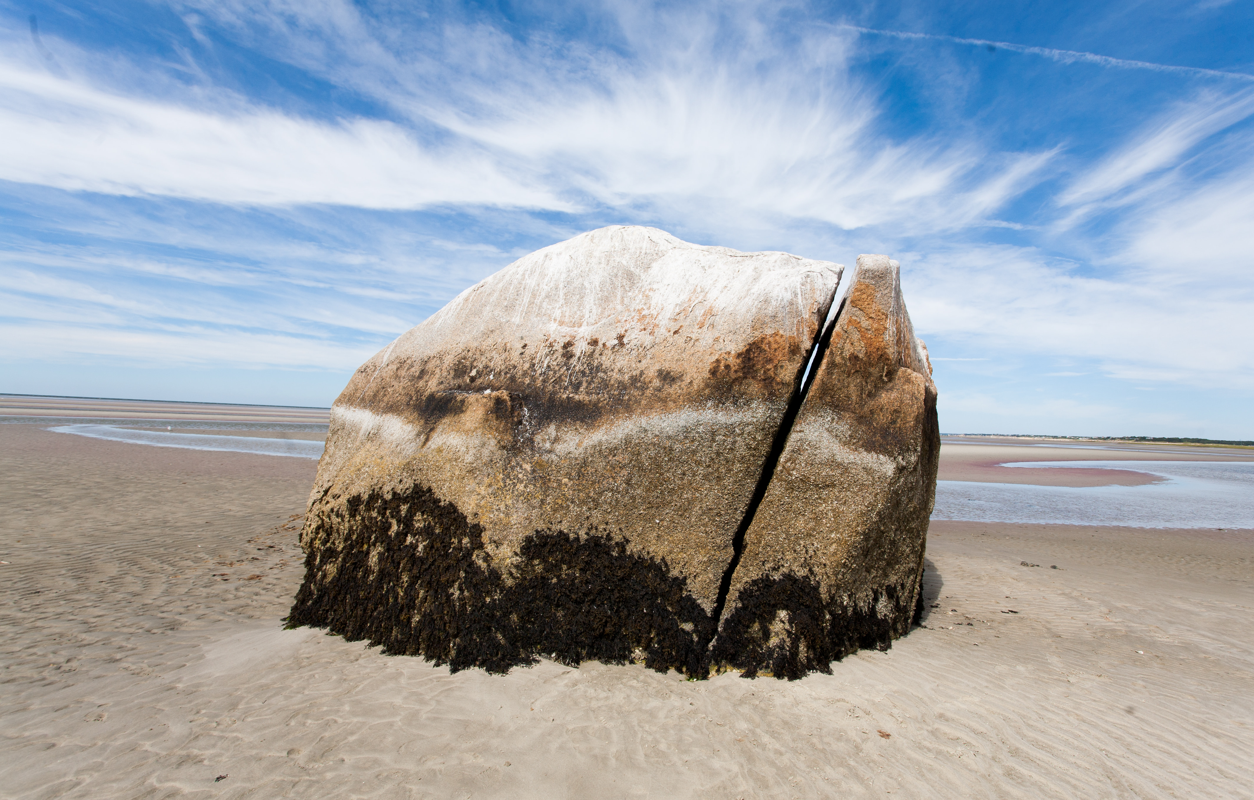Split boulder on beach